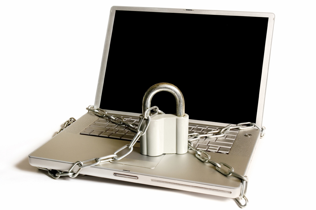 image of a laptop computer with a lock and chain on it. Click on this image to listen to the audio introduction to this section.